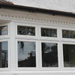 Timber stained casement windows